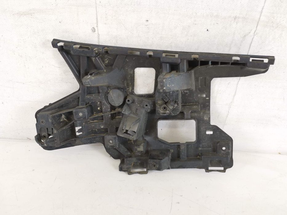 Ляв носач на предна броня Волво В40 2 [ - ] Оригинален, в добро състоя