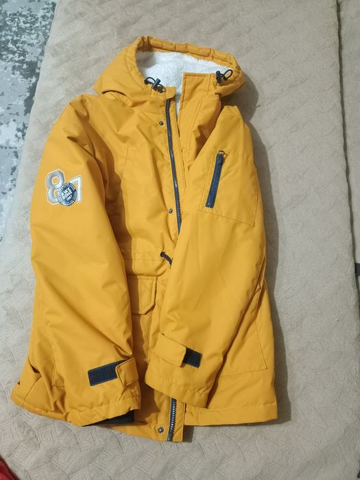 Куртки и пуховики