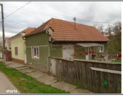 Cota 1/2 din casa si teren