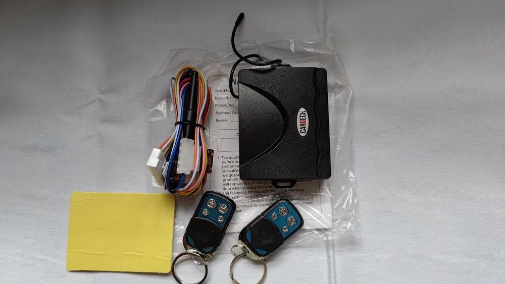 Modul închidere centralizata cu 2 telecomenzi  Cartech