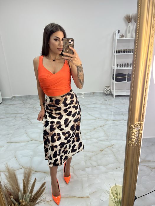 Елегантни дамски рокли