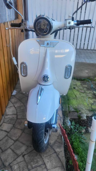 Електрически мотциклет тип Веспа