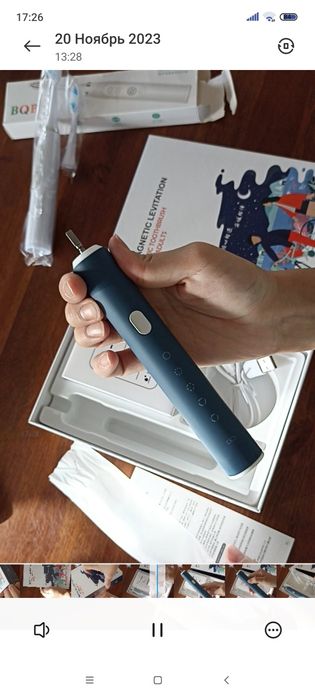 Электронная зубная щетка