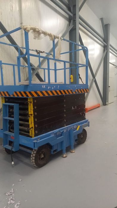 Подъёмник ножнечный