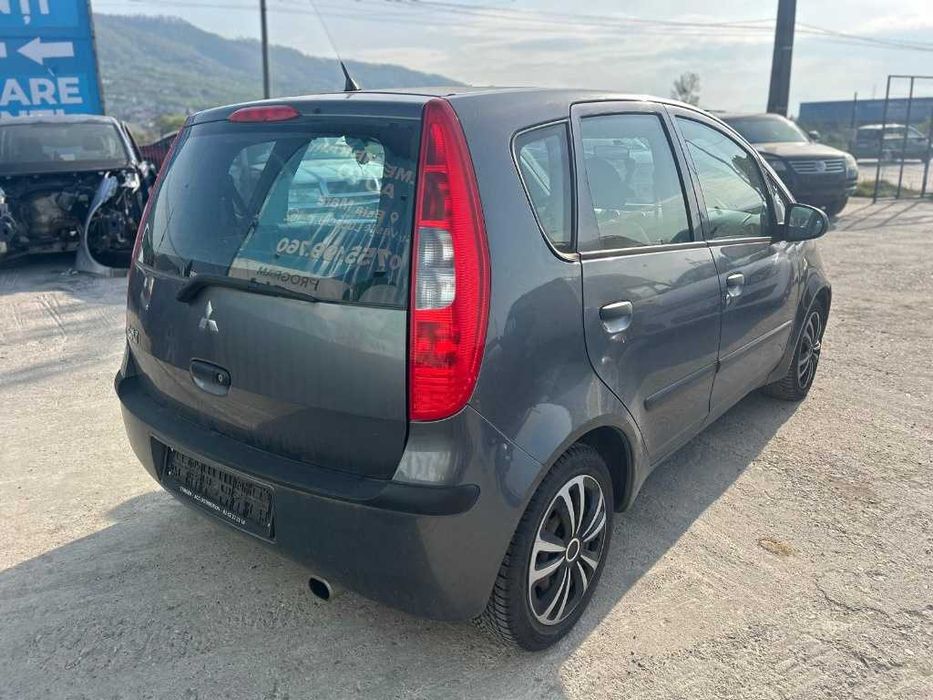 Dezmembrez Mitsubishi Colt 1.3i 2005 135.930