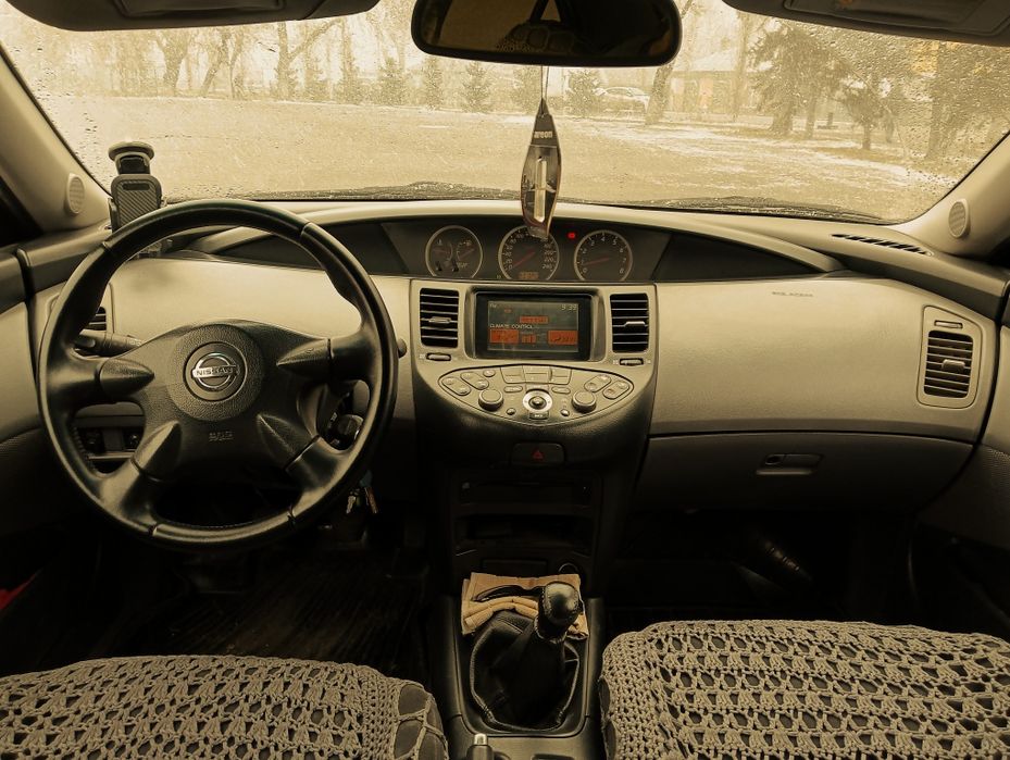 Ниссан Примьера P12