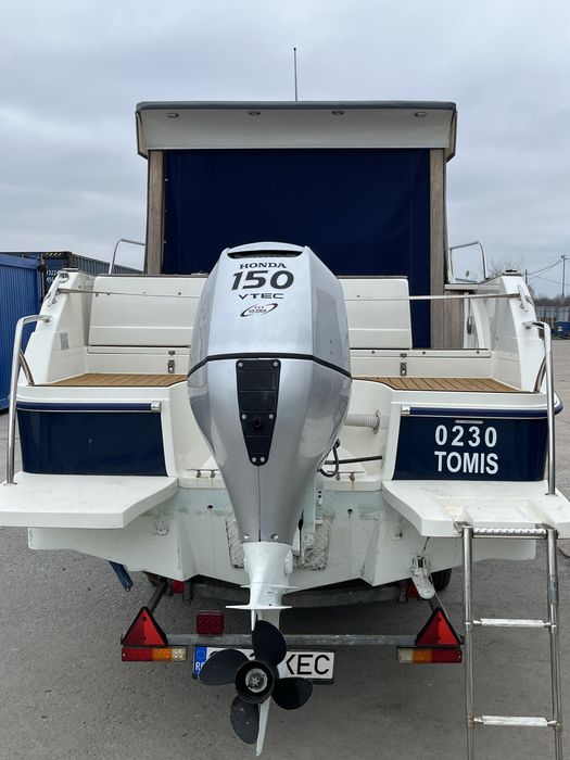 Ambarcatiune Pegazus 550 cabinata; motor honda 150;