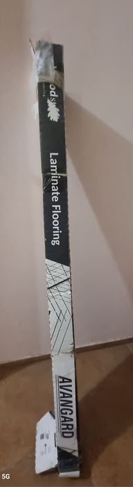 Продам ламинат серый 9шт пачка