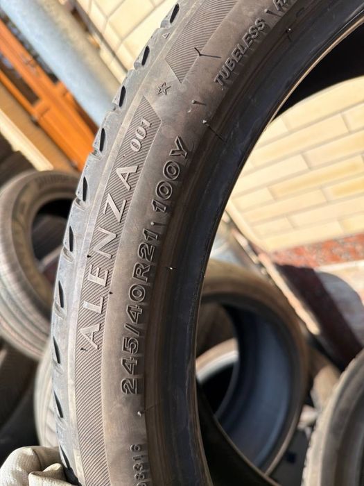 BRIGESTONE R21 orqa 275/35/21 oldi 245/40/21