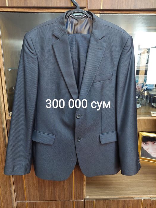 Сотилади костюм буруг  иктаси янги иктаси кийилган