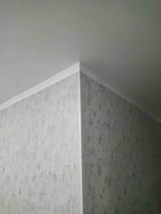 Поклейка обоев,галтель,плинтуса и т.д.