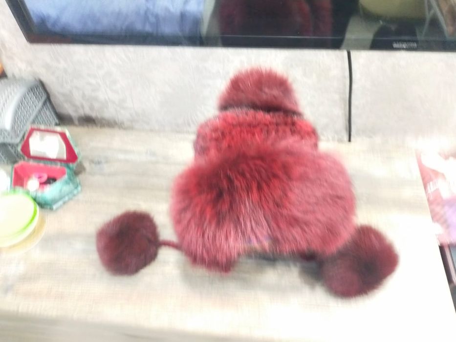 Шапка норка вязанная с бубонами