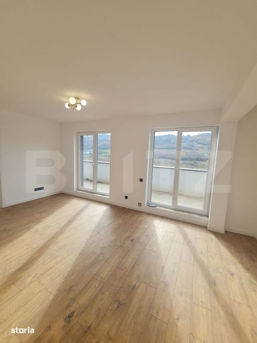 Apartament finisat, 52 mp utili, terasa 34 mp, zona Terra