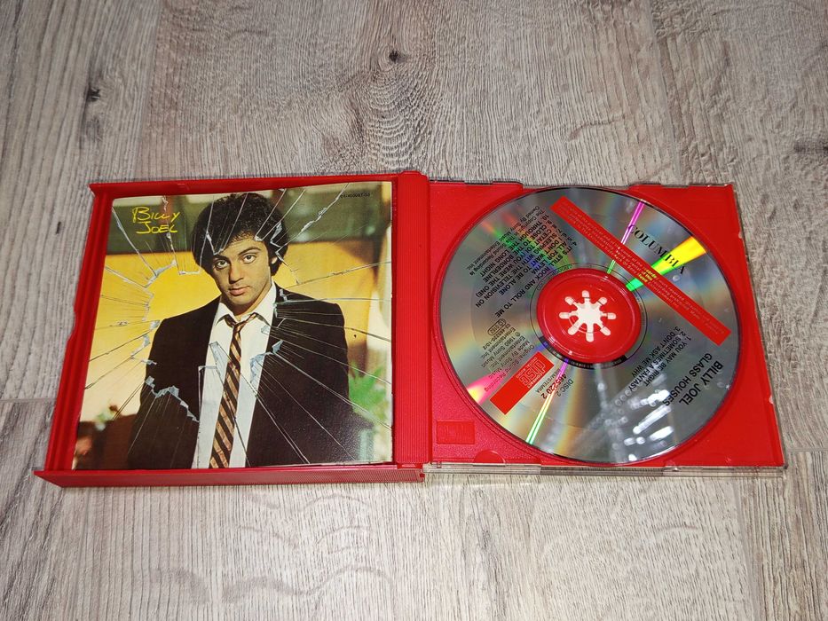 Компакт дискове Santana, Talking Heads, Billy Joel