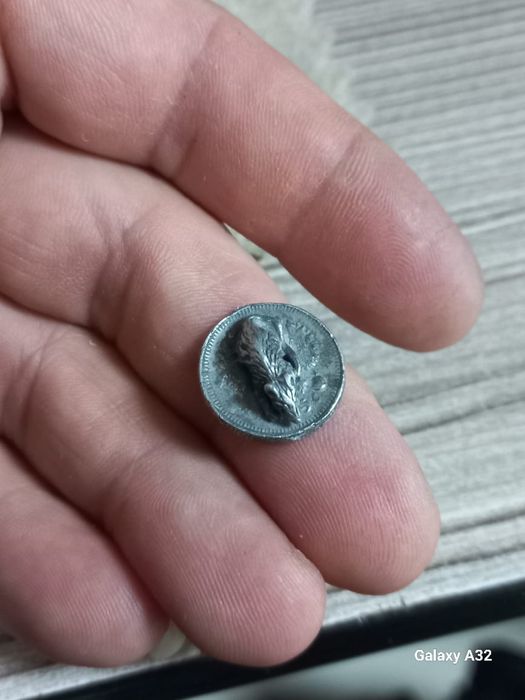 Старинная монета