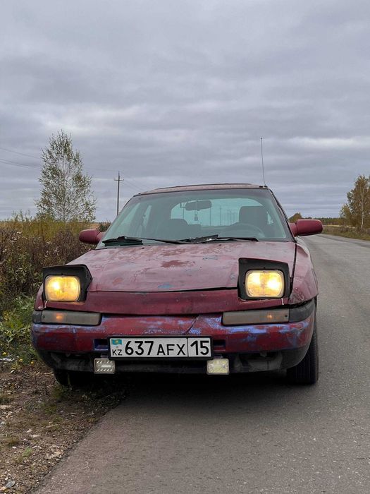 Автомобиль Mazda 323f bg