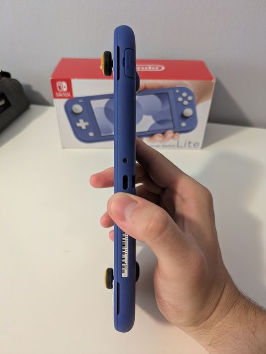 Nintendo switch lite ca nou + card Kingston 128gb