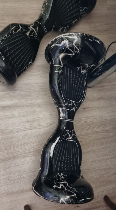 Г е р о с к у т е р