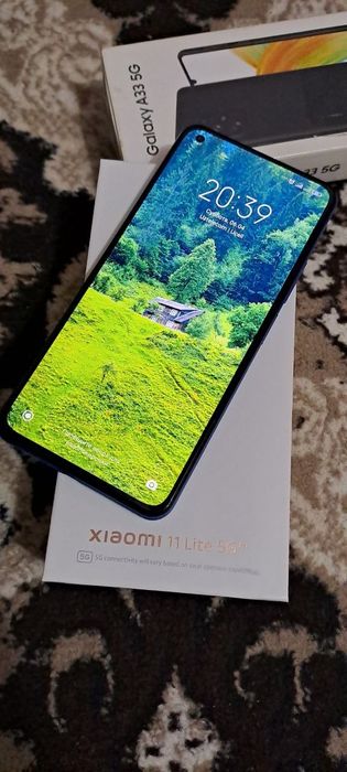 Xiaomi 11 lite sotiladi 8/128 xolati idel A+ xolatda.