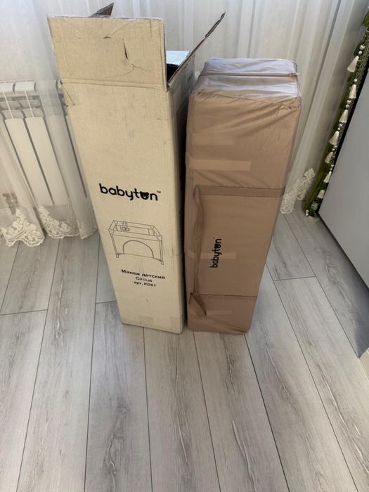 Продам манеж-кровать Babyton.
