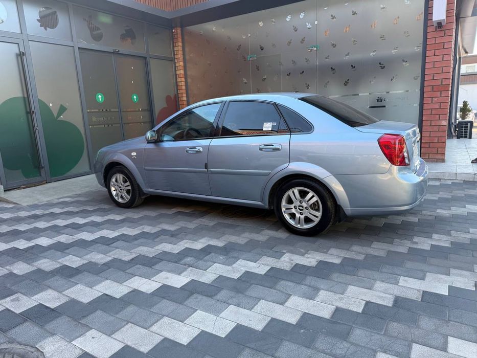 Lasetti 2012 yil 1.6 mator metan gaz