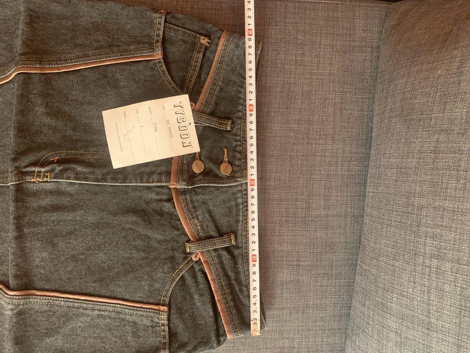 Оригинална дънкова пола с кожени  апликации