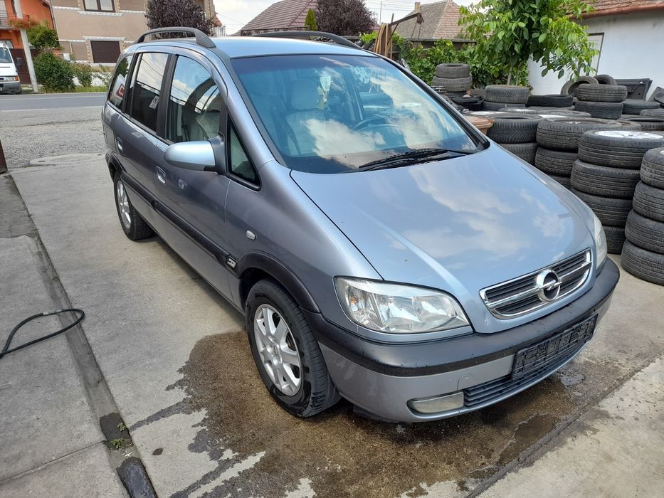 Far/faruri stanga/dreapta Opel Zafira A