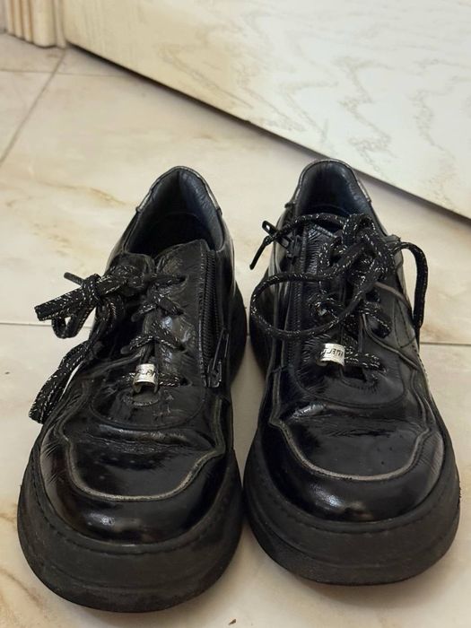 Черные кожаные кеды