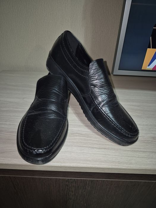 Новые мужские туфли