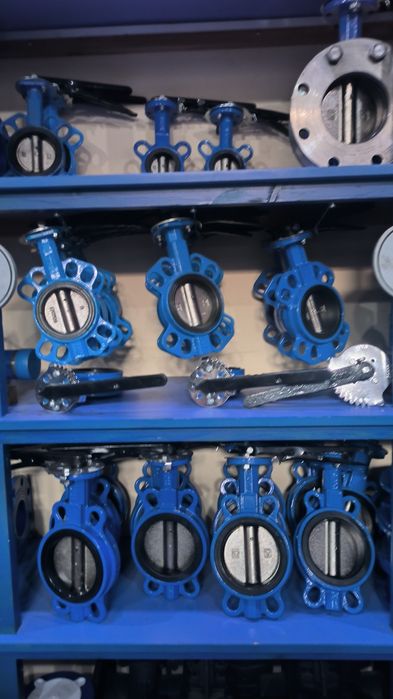 Затворы чугунные дисковые поворотные межфланцевые