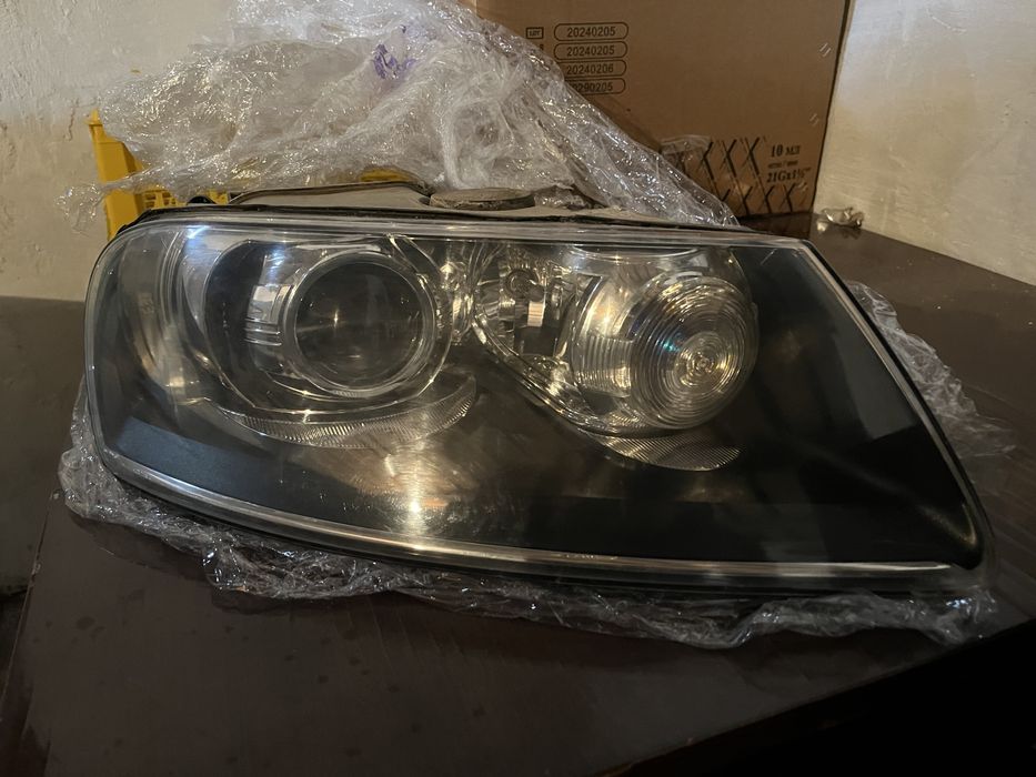 Фара на Туарег оригинал