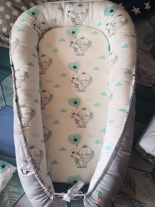 продам кокон для новорожденного