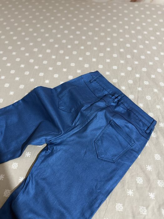 Pantaloni piele  evazati  albastru metalic