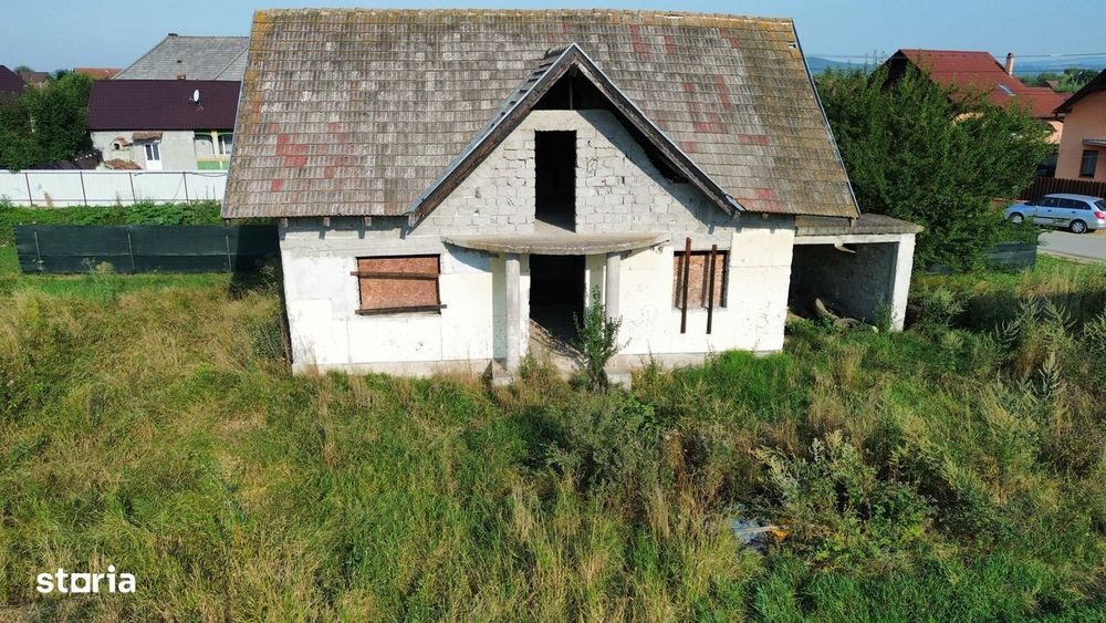 Casa la rosu Lunca Calnicului ,Prejmer,Brasov, teren 1000 mp.