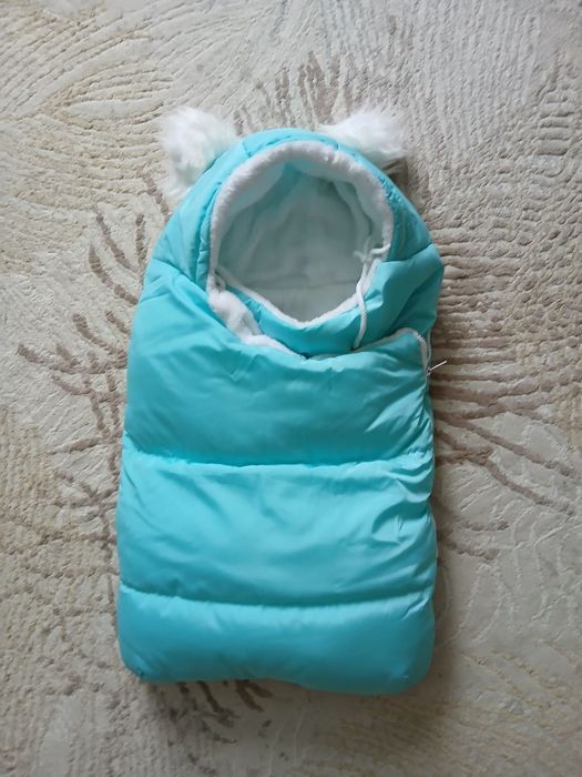 Продам теплый конверт на выписку