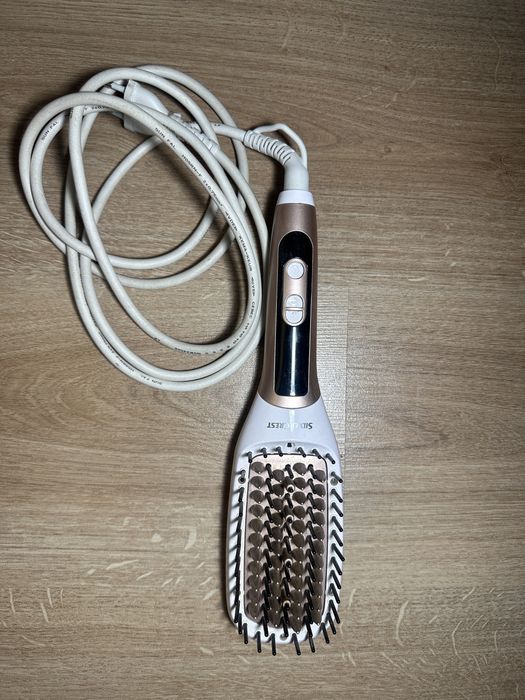 Електрическа четка за изправяне на коса