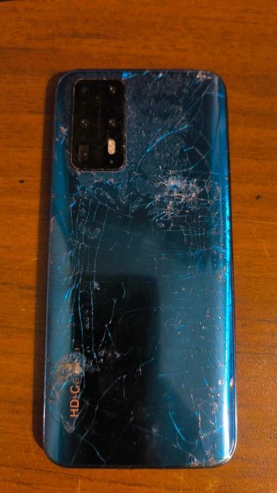 Телефони за части