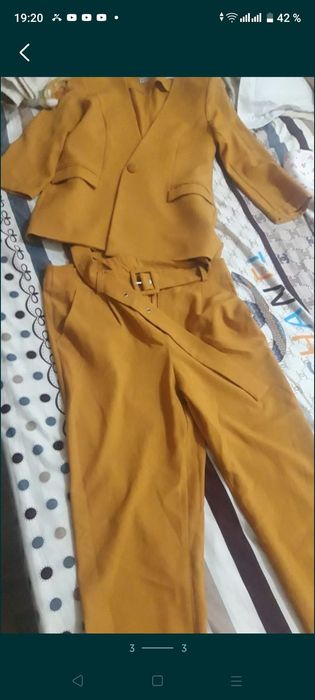 Продам брючный костюм комплект