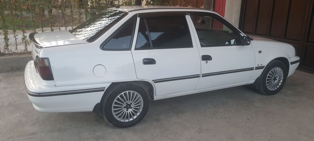 Нексия  2006год сонс