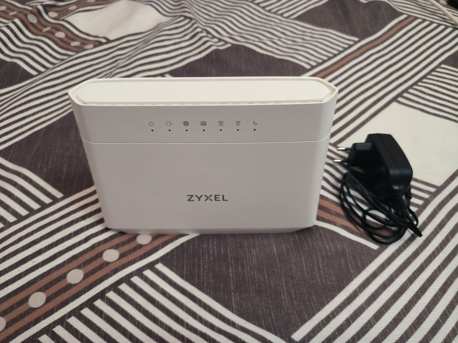 Продам  Wi-Fi роутер Оптика ZYXEL EMG5523-T50B 2.4ГГц и 5 ГГц