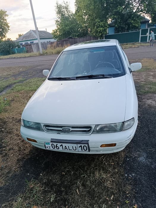 Автомобиль киа сепия