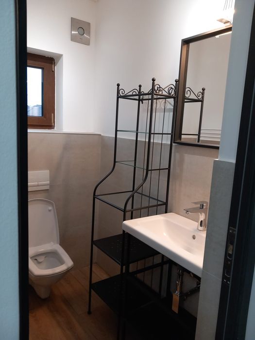 Apartament cu o camera, loc de parcare, curte privata