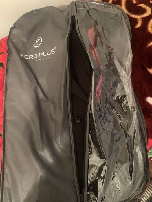 Продам двубортный костюм