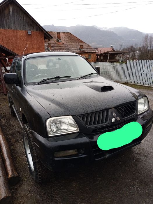 Vand l 200  autoutilitara