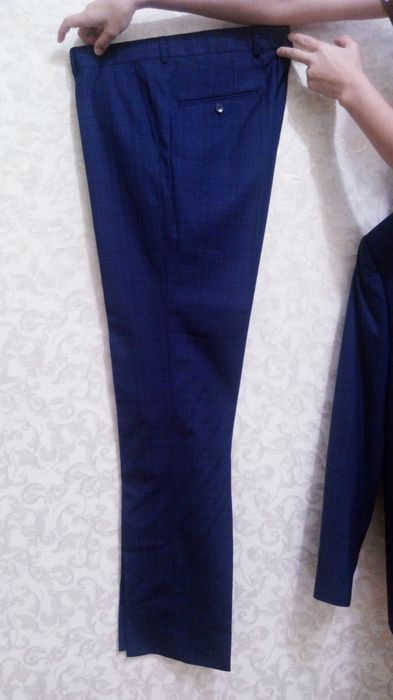 Продам новый костюм с брюками