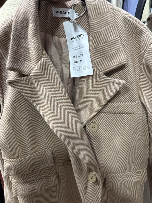 Продам новое пальто