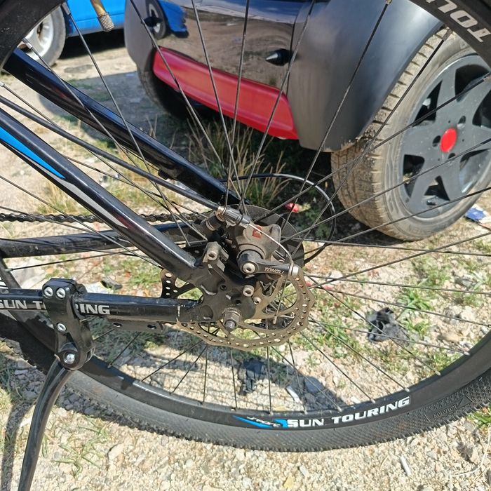 Bicicleta aproape noua