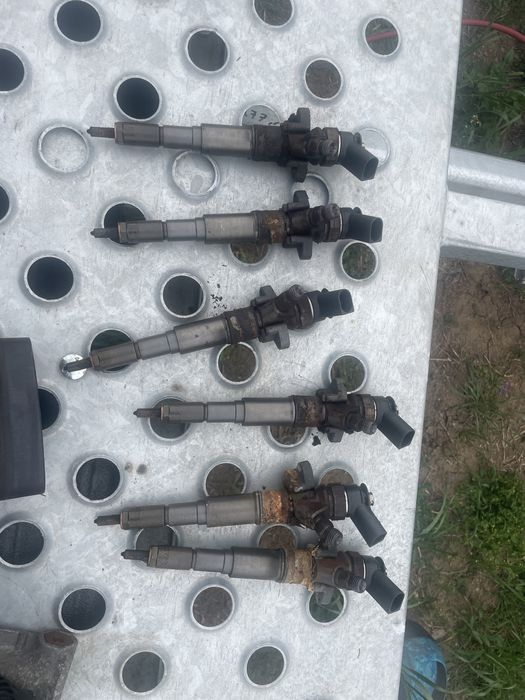 Injectoare BMW E90 E91 E87 E46 E92 E93 E60