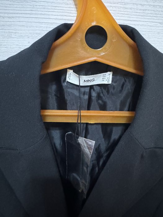 Продам новый костюм