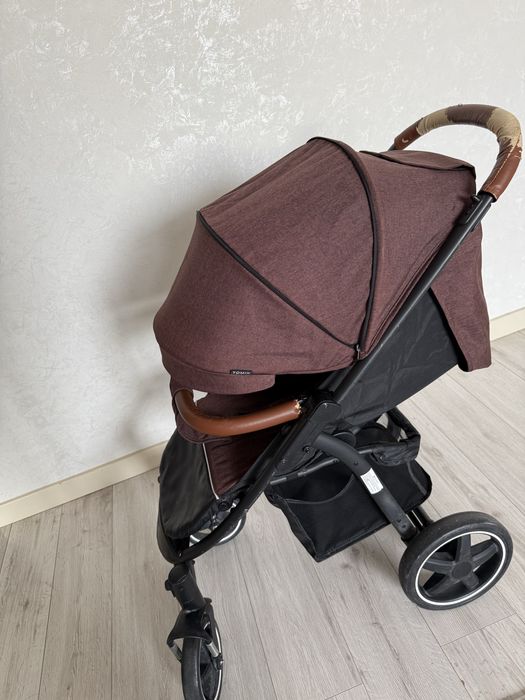 Продам всесезонную прогулочную коляску tomix